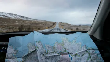 a car with a map on the windshield