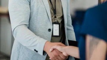 a man with a name tag